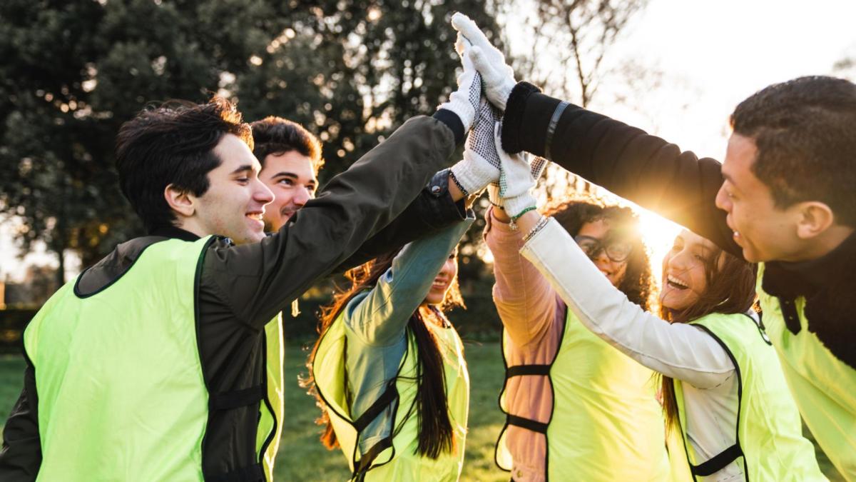 Junge Menschen Teamwork High Five