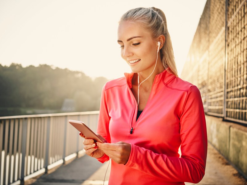 Frau Joggen Smartphone