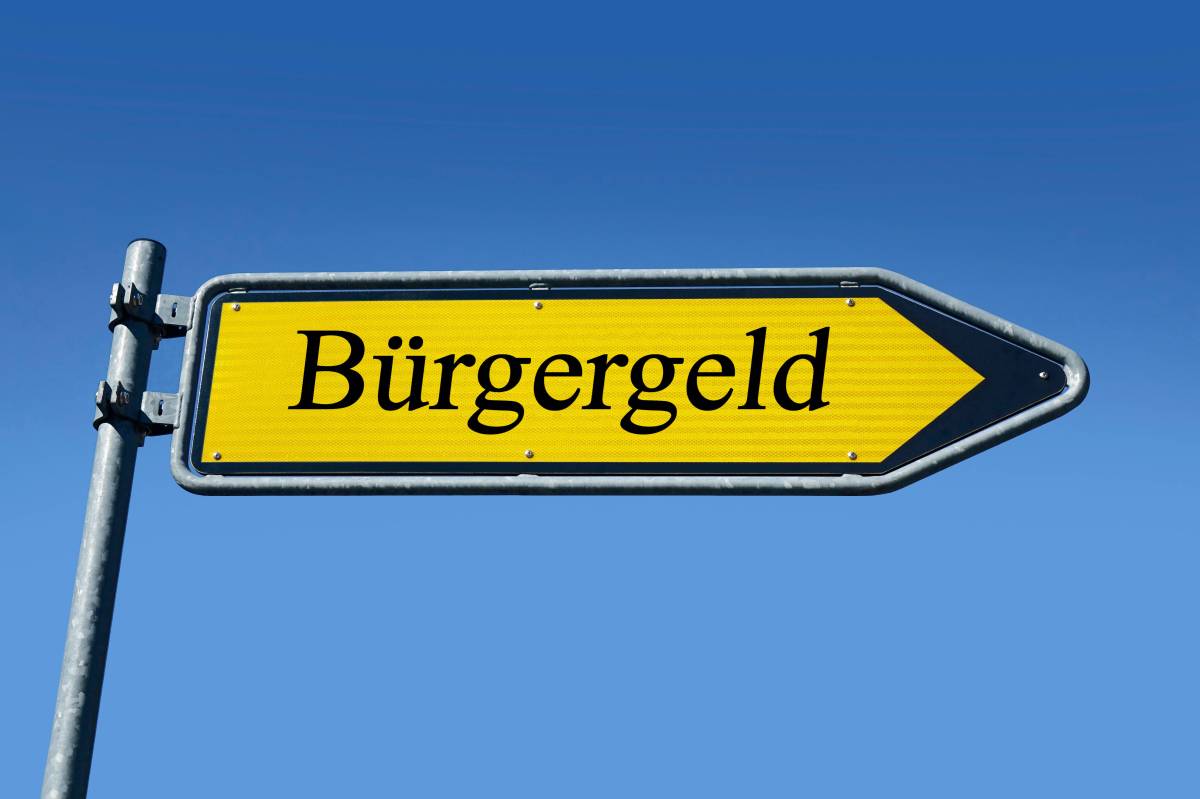 Ein gelbes Schild mit der Aufschrift "Bürgergeld"